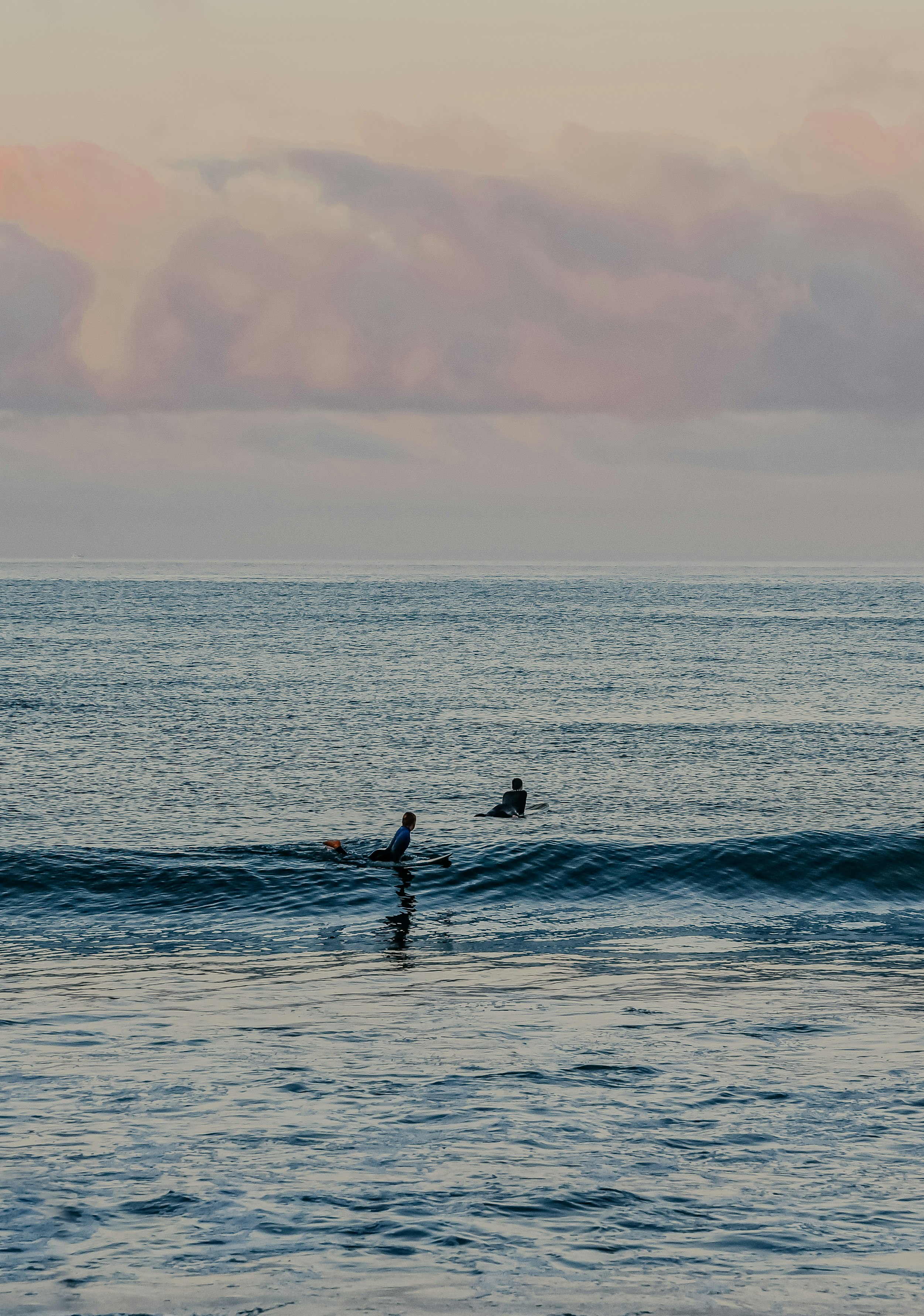 person surfing on sea during daytime